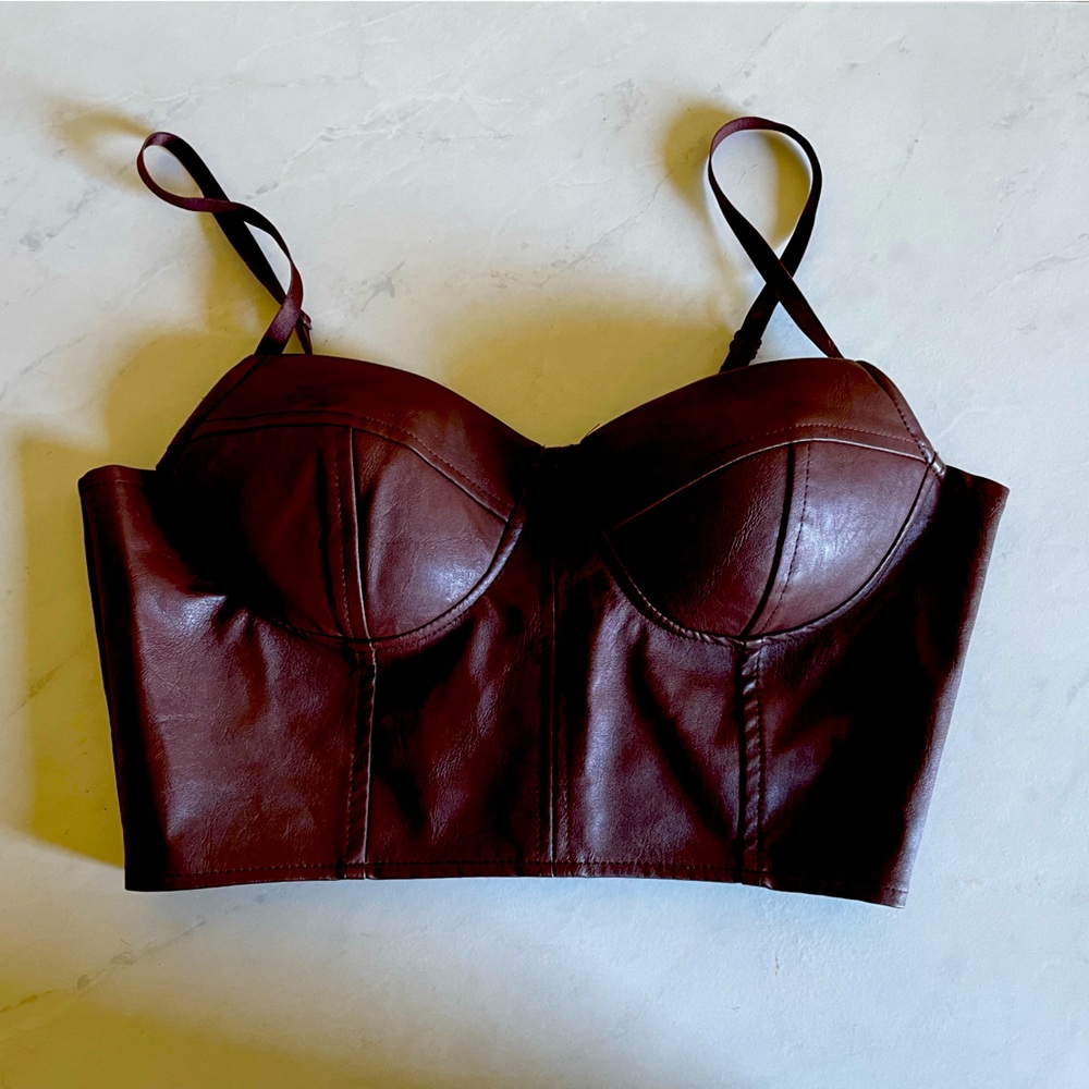 Haute Monte 2 piece faux leather skirt and boustier set.